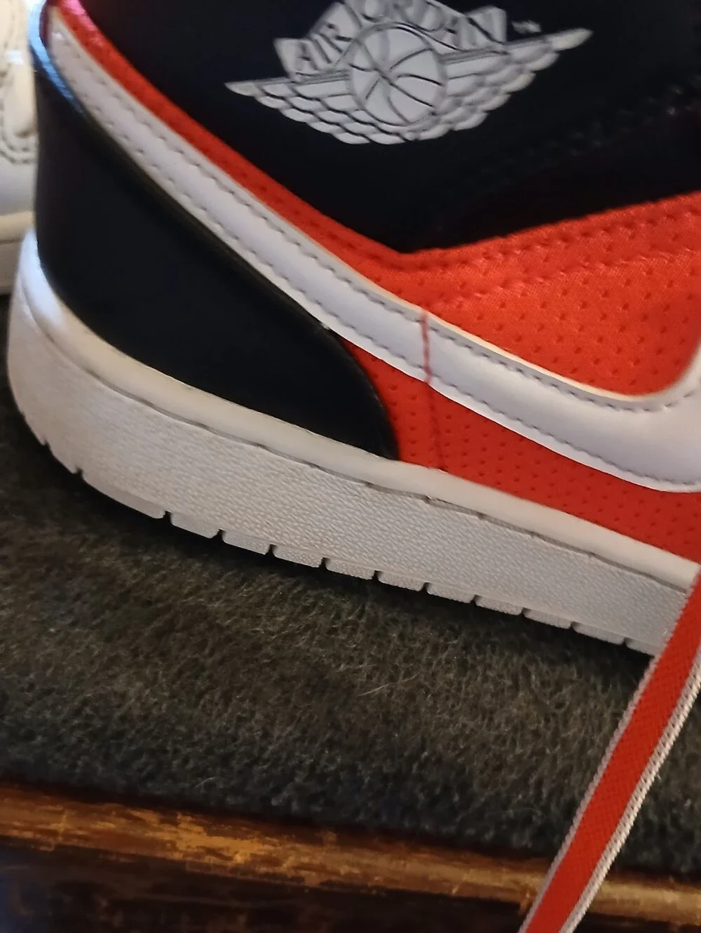 Nike Kids White and Orange High-Top Sneakers with Black Accents